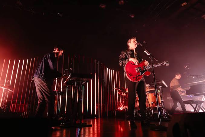 Foster The People performing live on stage